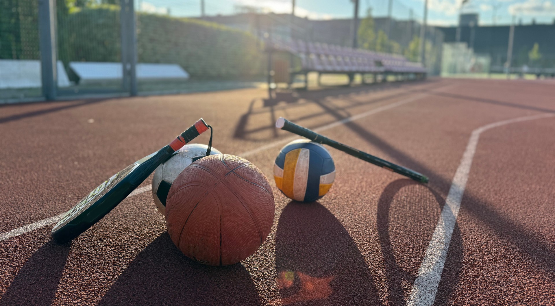 High Angle View Of Various Sport Equipments On playground